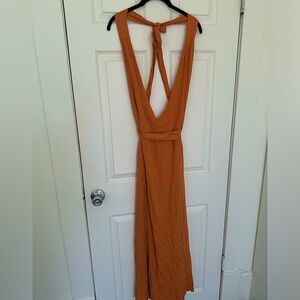 12th Tribe. Beautiful halter low back wrap dress.